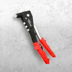 Remachadora manual con mangos rojos. Así es cómo funciona una remachadora para unir materiales.